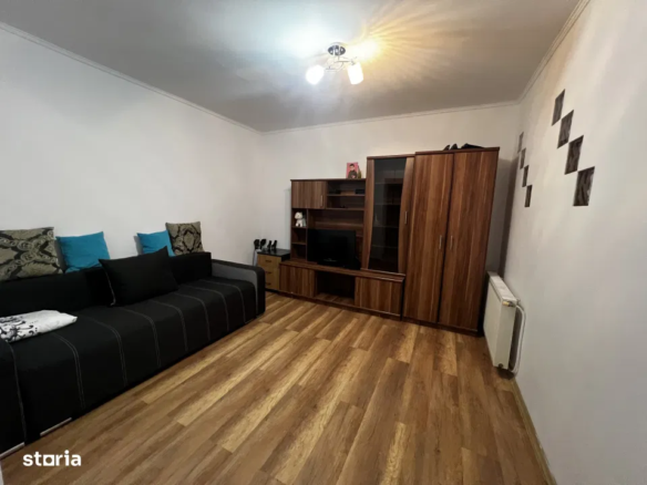 Camera în apartament cu 3 camere, situat în zona Porii, Florești, Cluj.